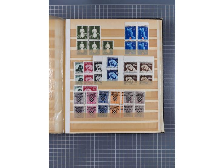 1941/45, mostly mint never hinged collection, essentially in blocks of four, including Officials and Postage dues, together w