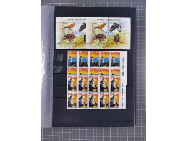 1960/2004, Stamps in blocks, all mint never hinged, including complete sheet animals 1979, 43 souvenir sheets, very fine.