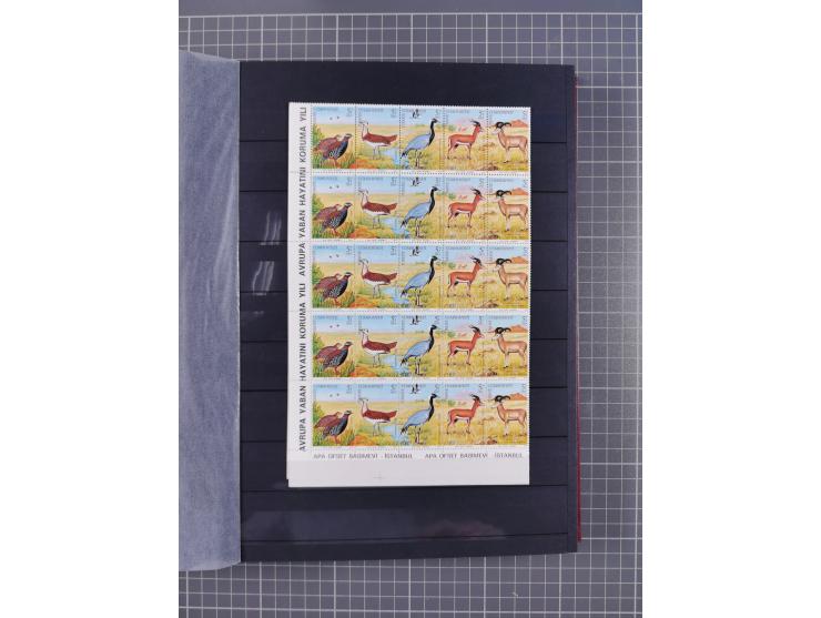 1960/2004, Stamps in blocks, all mint never hinged, including complete sheet animals 1979, 43 souvenir sheets, very fine.