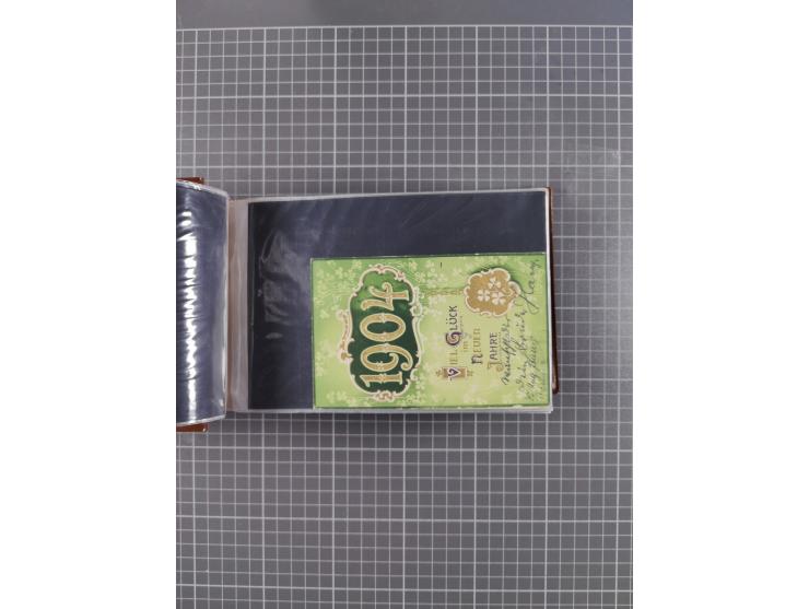 Glückwunschkarten Neujahr: 1900/14, Album mit 110 Lithos zum Thema Jahreszahlen", davon sind 104 St. geprägt