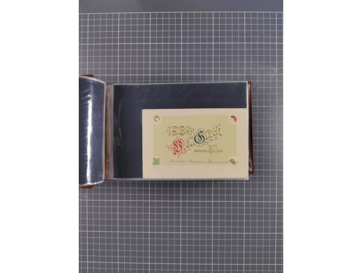 Glückwunschkarten Neujahr: 1900/14, Album mit 110 Lithos zum Thema Jahreszahlen", davon sind 104 St. geprägt