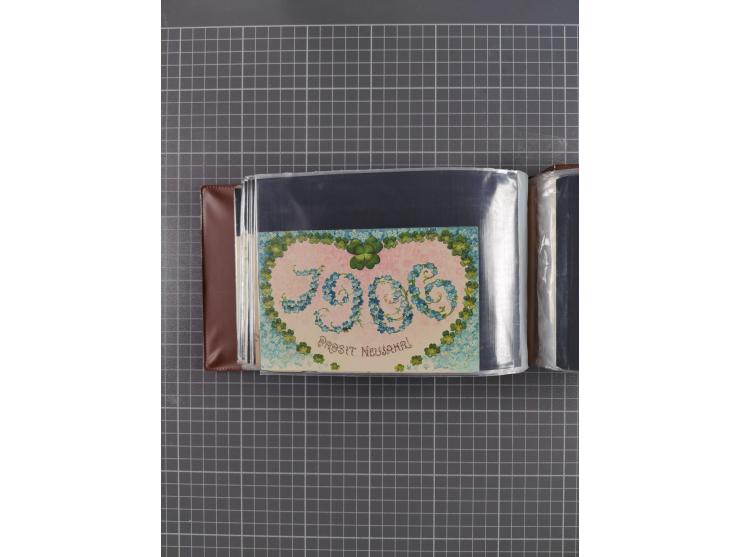 Glückwunschkarten Neujahr: 1900/14, Album mit 110 Lithos zum Thema Jahreszahlen", davon sind 104 St. geprägt