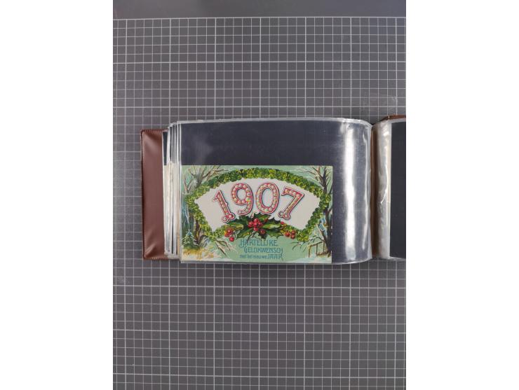 Glückwunschkarten Neujahr: 1900/14, Album mit 110 Lithos zum Thema Jahreszahlen", davon sind 104 St. geprägt