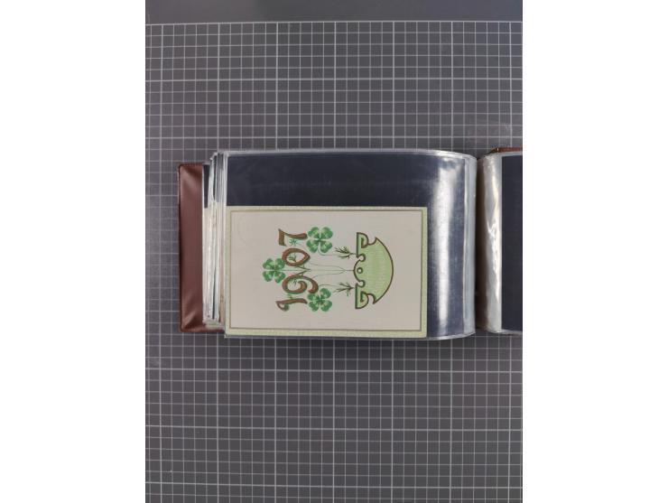 Glückwunschkarten Neujahr: 1900/14, Album mit 110 Lithos zum Thema Jahreszahlen", davon sind 104 St. geprägt