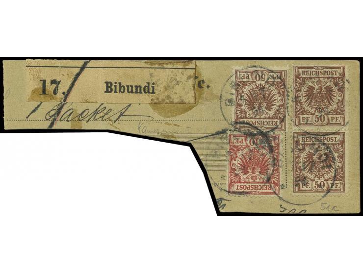10 Pfg. rosarot sowie 50 Pfg rötlichbraun, senkrechtes Paar und Einzlmarke, jeweils mit Stempel "BIBUNDI 5/7 94" auf Paketkar
