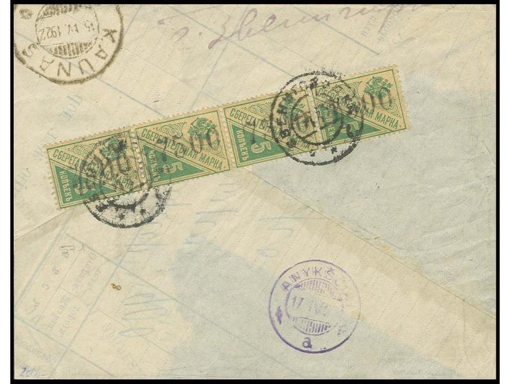 KIEV: 1922, 7500 on 5 k. pale yellow brown/green, vertical strip of four, tied by cds. to large part of cover to Lithuania, f