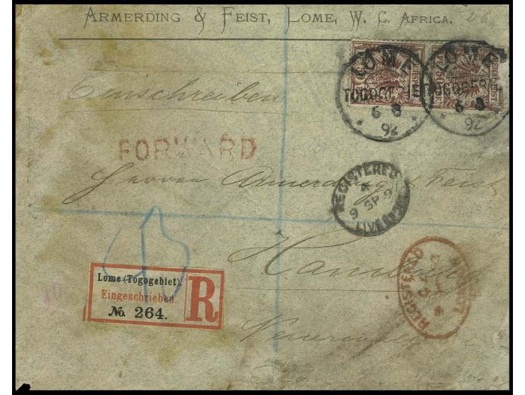 50 Pfg. braunrot im senkrechten Paar mit Stempel "LOME 6 8 94" auf Bedarfs-R-Brief über Quittah und Großbritannien nach Hambu