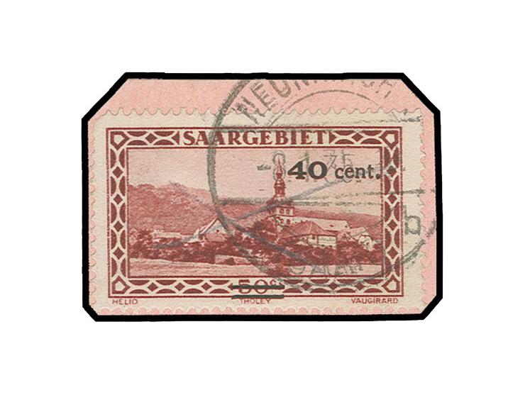 1934, Freimarke 40 C. mit Aufdruck in rot und zusätzlich in schwarz, mit Stempel von Neunkirchen auf Briefstück, etwas eckrun