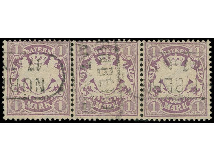 1874, 1 M. violett im waagerechten 3er-Streifen mit Ra2 von Nürnberg, links in der Zähnung leicht gefaltet und linke Marke ei