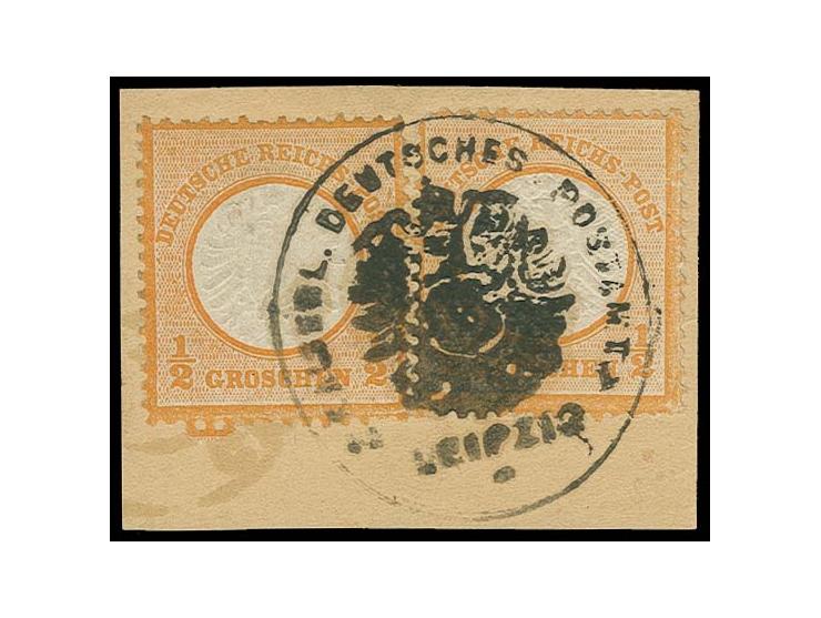½ Gr. orange (2) mit Postamtsiegelstempel "KAISERL. DEUTSCHES POSTAMT LEIPZIG" auf Briefstück, die rechte Marke hat einen ver