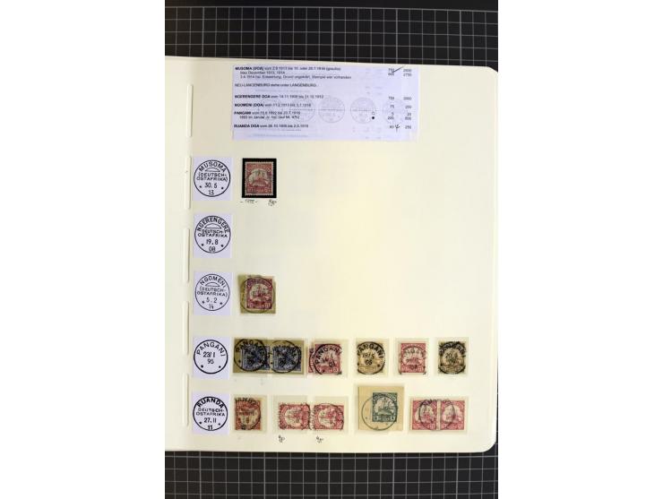 1893/1915, interessante Stempel-Sammlung von Amani bis Wugiri auf losen Marken und vielen Briefstücken, dabei einige bessere 