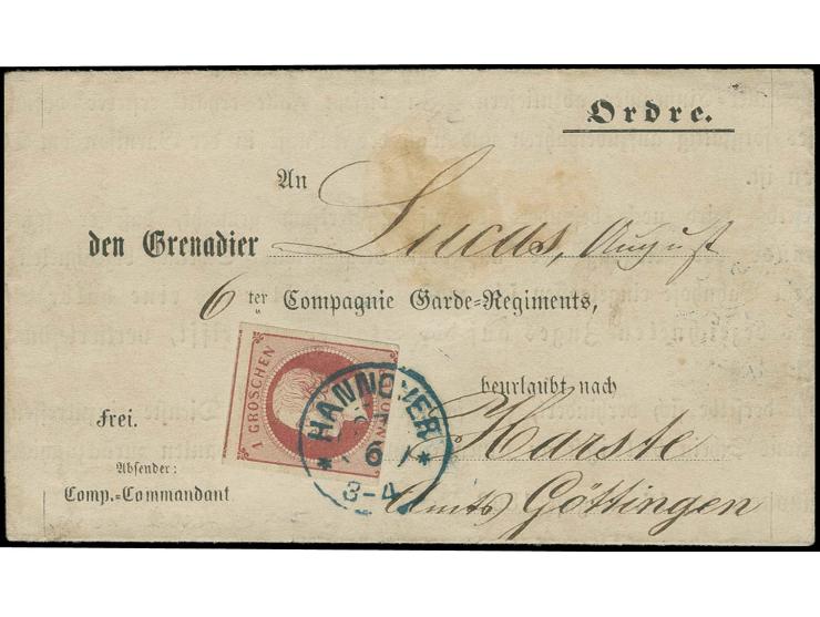 1 Gr. karmin, unten angeschnitten, sonst breit- bis überrandig mit blauem DKr. "HANNOVER 27/6" (1863) auf vorgedrucktem Einbe