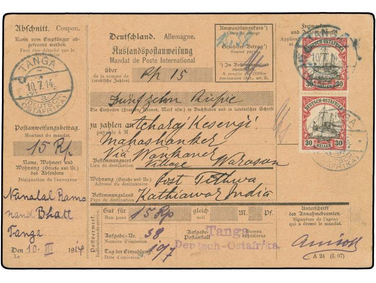 30 H. im senkrechten Paar mit Stempel "TANGA a 10.7.14" auf vollständiger Postanweisung mit Coupon nach Indien; es sind einig