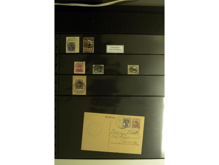 1920, Stempelsammlung auf losen Marken, Briefstücken und 28 Briefen, Karten und Ganzsachen, Postanweisungen und Paketkarte, d