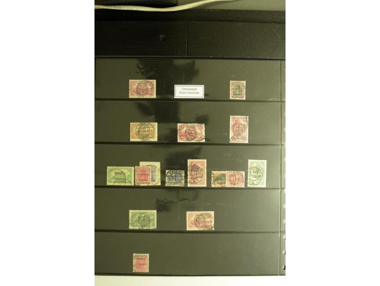 1920, Stempelsammlung auf losen Marken, Briefstücken und 28 Briefen, Karten und Ganzsachen, Postanweisungen und Paketkarte, d
