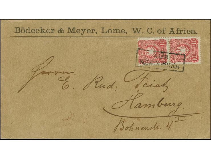10 Pfg. dunkelrosarot im senkrechten Paar mit Ra2 "AUS WESTAFRIKA2" auf Vordruckbrief der Fa. Bödecker & Meyer aus Lome nach 