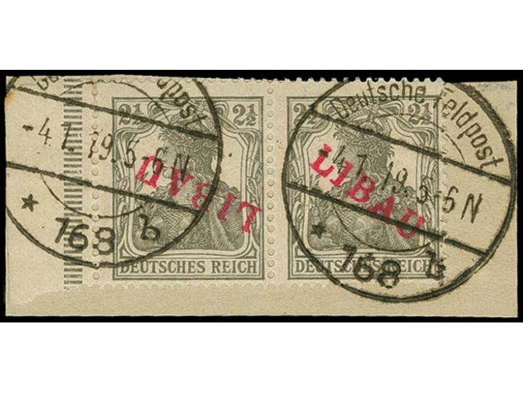 2½ pfg. as horizontal pair with left sheet margin, the left stamp with inverted overprint, tied by cds. to piece, fine, certi