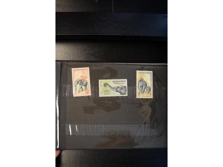 LAOS UND KAMBODSCHA: 1950/80 (ca.), umfangreicher Sammlungsbestand in 4 Schubern und Kiste mit vielen ungezähnten Ausgaben un