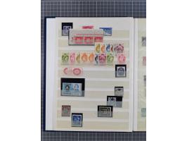 1880/1940 (ca.), interessante Partie in 6 Steckbüchern, dabei u.a. Kolonien sowie schöner Teil Infla mit vielen guten signier