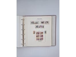 1948/90, in den Hauptnummern augenscheinlich komplette gestempelte Sammlungen Berlin 1948-90 und DDR 1949-90, sowie eine fast