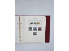 1948/90, in den Hauptnummern augenscheinlich komplette gestempelte Sammlungen Berlin 1948-90 und DDR 1949-90, sowie eine fast