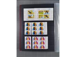 1960/2004, Stamps in blocks, all mint never hinged, including complete sheet animals 1979, 43 souvenir sheets, very fine.