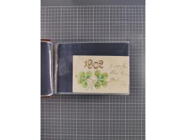 Glückwunschkarten Neujahr: 1900/14, Album mit 110 Lithos zum Thema Jahreszahlen", davon sind 104 St. geprägt