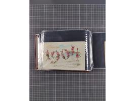 Glückwunschkarten Neujahr: 1900/14, Album mit 110 Lithos zum Thema Jahreszahlen", davon sind 104 St. geprägt