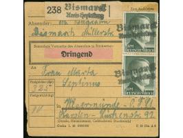 “Bismarck / Kreis Heydekrug”, Notzweizeiler auf beidseitig mit 25 Pfg. und 3 x 1 RM. Hitler frankierter Paketkarte nach Weser